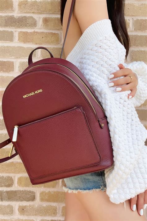 burgundy michael kors backpack